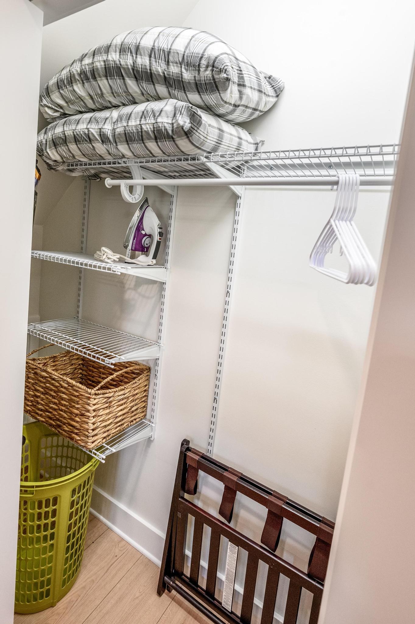Guest closet, extra bedding, luggage rack and storage