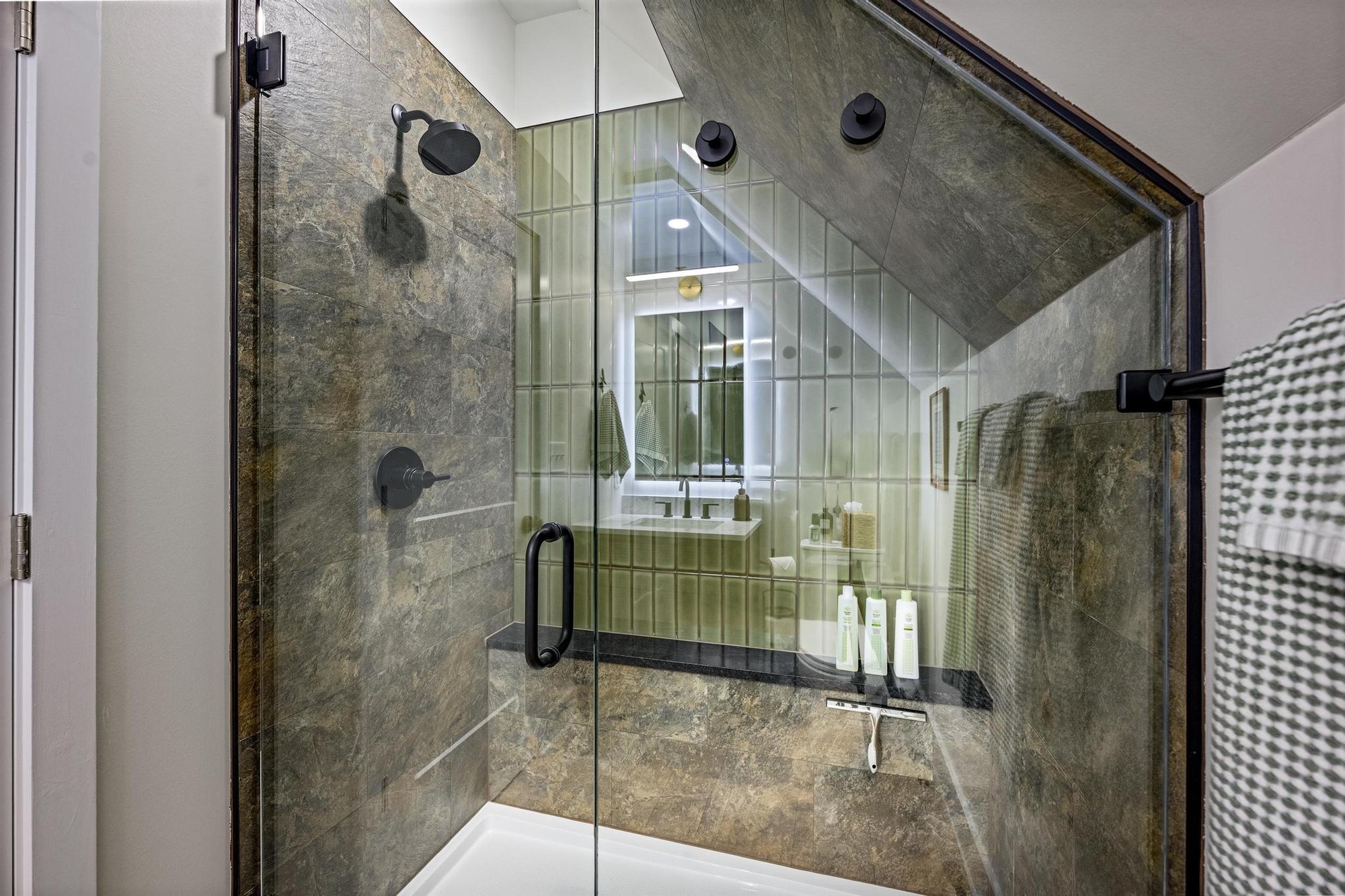 Glass walk-in shower at The Roost